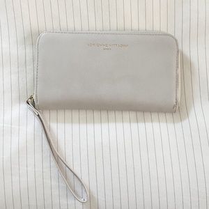 Grey and gold phone charging wristlet 📱